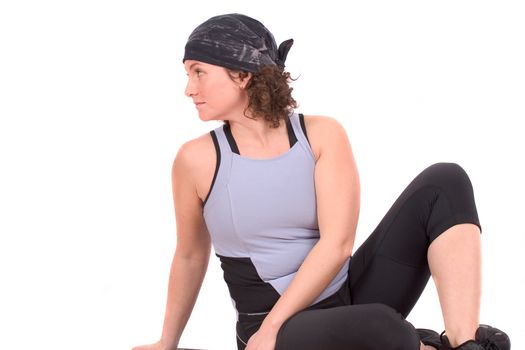 Woman in a stretch position to stretch her back  muscles