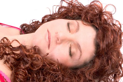 Beautiful redhaired woman sleeping
