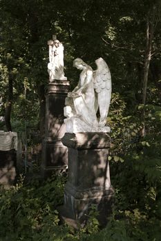 Monument in the form of an angel on an old cemetery
