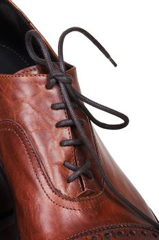 Man's brown boot on a white background