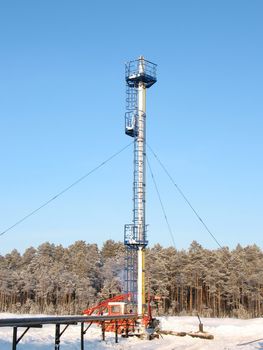 Industrial construction and mechanism. Work of oil industry. Mounting of gas pipeline in wild Siberian taiga.

