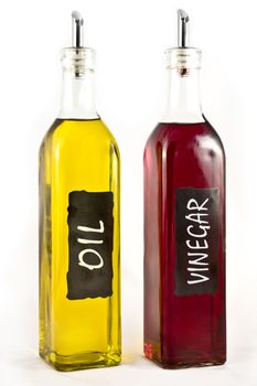 Olive Oil and Vinigar isolated over white background