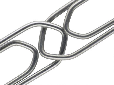 Two linked paperclips on a white background