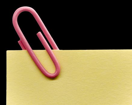 Paperclip on a note