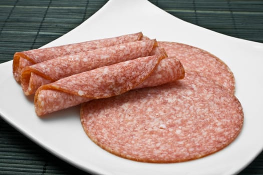 Slices of Salami on a plate