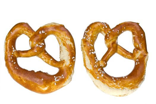 two bavarian pretzels isolated on white