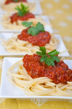 spaghetti with tomato sauce and parsley
