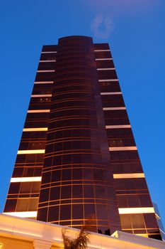 The night scene of commercial building over blue sky