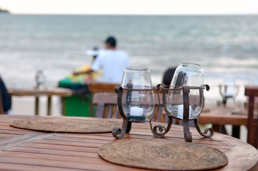 Table set of open-air restaurant, on beach