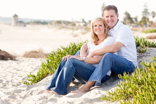 Attractive Caucasian Couple Relaxing and Enjoying the Beach Together.