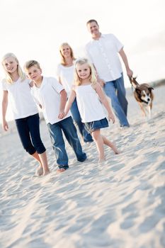 Adorable Little Girl Leads Her Family on a Walk at the Beach.