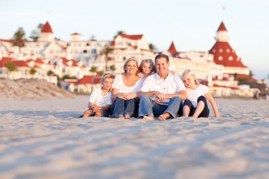 Happy Caucasian Family in Front of Hotel Del Coronado on a Sunny Afternoon.