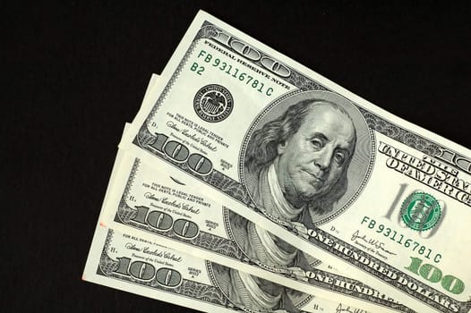 Three hundred bucks with black background