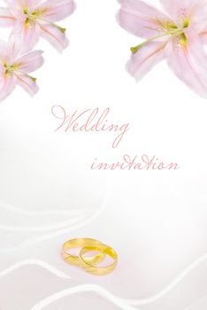 wedding invitation or greeting card blank with lily flowers and golden rings