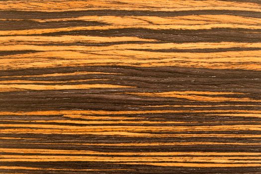 Macro image of wood grain horizontally across the image