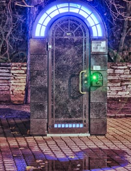 Modern illuminated pay restroom in Tallinn in Estonia