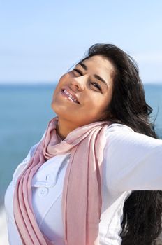 Portrait of beautiful smiling hopeful native american girl