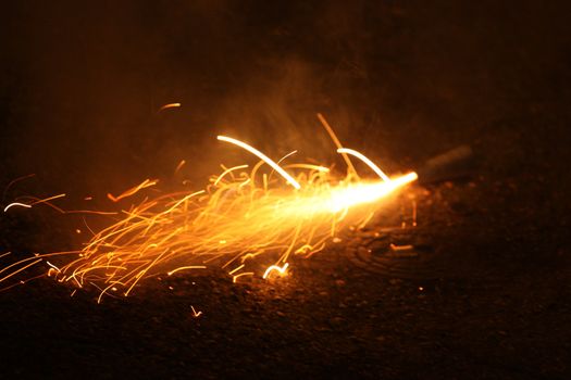 burning firecracker on New Year's Eve 