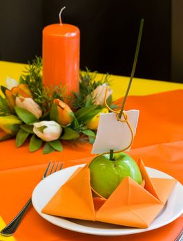 Decorated wedding table. Green apple with name card