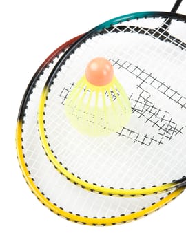 Badminton racquets with shuttlecock on white background