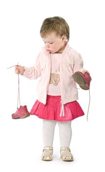 Child with pink jacket. Isolated on white