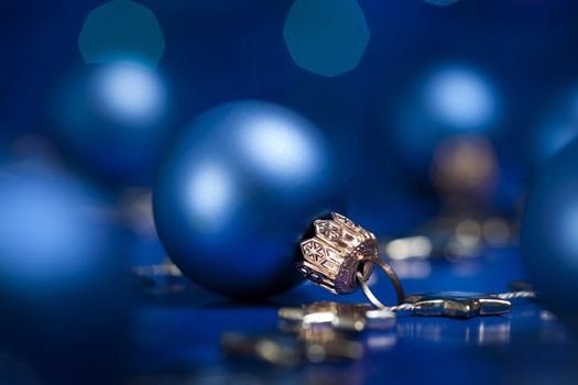 Christmas decoration with bauble. Selective focus on ball. aRGB. 