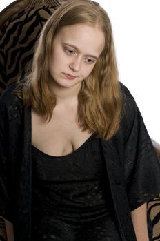 young woman looking sad in a night gown