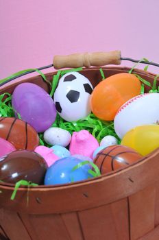 a basket of eggs and candy for easter