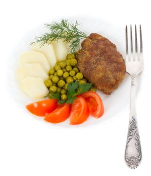 close-up schnitzel with vegetables, isolated on white