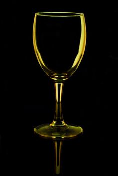 transparent empty wine glass, isolated on black