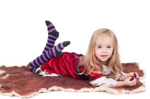 Beautiful baby girl dressed up for Christmas isolated in white