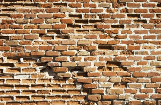 Old brick wall in the sunny day in Madrid