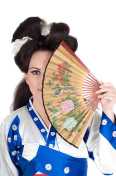 Portrait of the girl of the Asian appearance with a make-up under the geisha on a white background