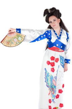 Portrait of the girl of the Asian appearance with a make-up under the geisha on a white background