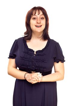 Happy Young Caucasian Woman with Hands Folded Smiling on a White Background.