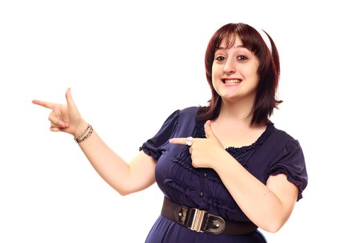 Happy Young Caucasian Woman with Hands Pointing to the Side Isolated on a White Background. 
