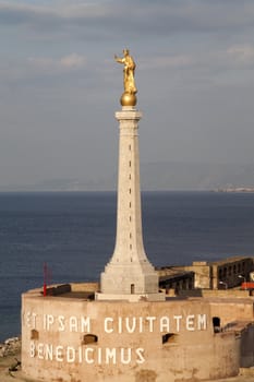 The statue of Madonna in the port of Messina, Italy