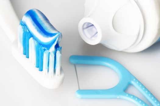 Dental care products on bright background