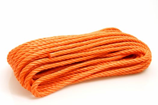Orange rope on bright background