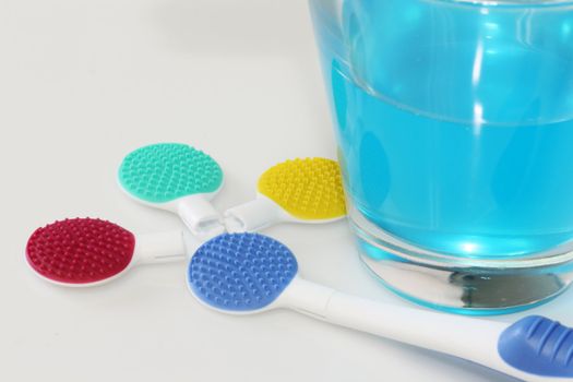 Tongue cleaner and dental care products in detail