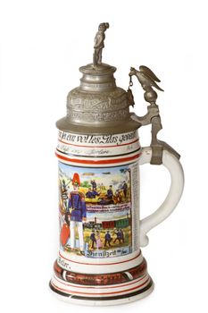 A traditional German military beer jug the with silver lid isolated on white background. 