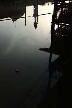 shadow of mosque on the water