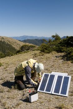 It is the solar energy in outdoors. And a man was working for it.