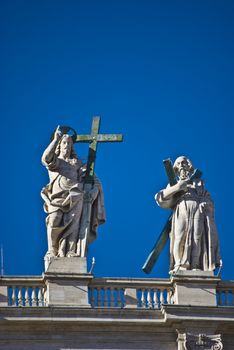 some of the statues of the apostel on the roof of San Pietro