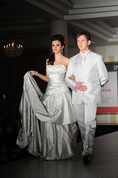 SIEDLCE, POLAND - NOVEMBER 19: models showcasing designs from Vidio wedding collection walk the catwalk at the Siedlce Fashion Evening on November 19, 2010 in Siedlce, Poland