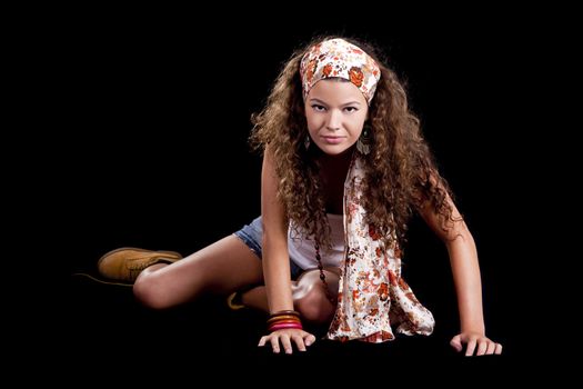 Beautiful and fashion young woman isolated on a black background