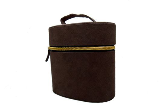 Brown cosmetic bag on white