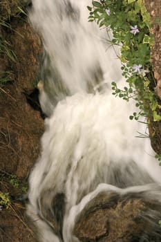water tumbling down the waterfall