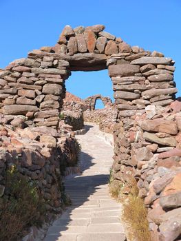 Old arch build out of undressed stones, Amantani Island, Titicaca Lake