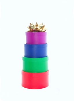 assorted stacked gift boxes and ribbons isolated